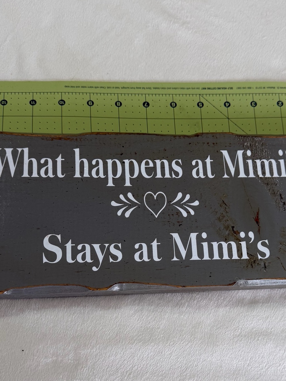 What happens at Mimi's Stays at Mimi's Sign - Gray